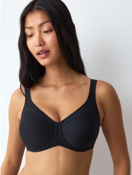 sujetador reductor triumph modern soft coton en color negro, vista frontal sobre modelo