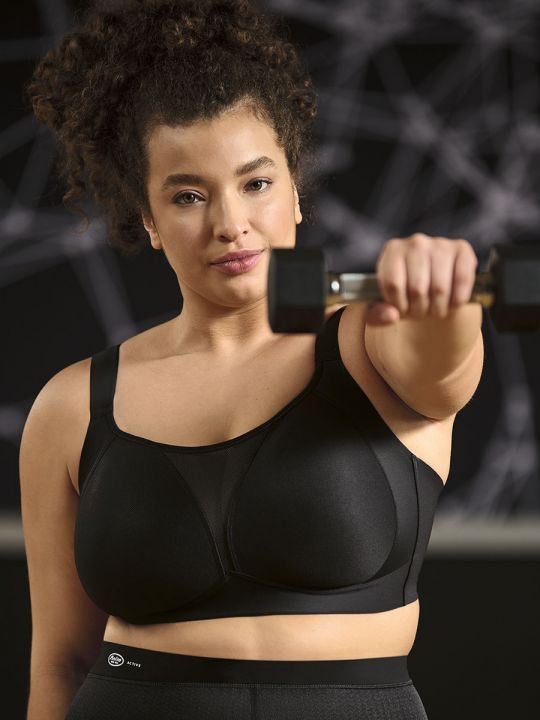 Sujetador deportivo negro Anita Active Smart Control 5530, vista frontal sobre modelo. Foto de catálogo